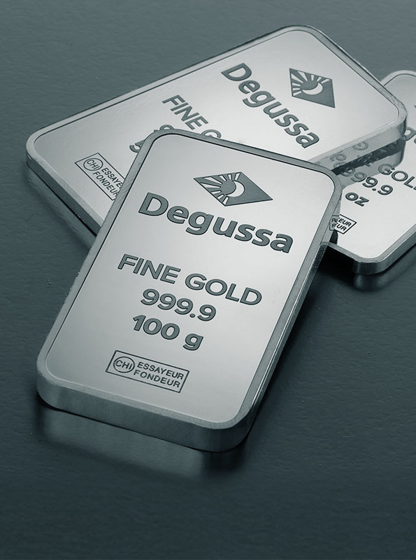 Degussa Goldbarren auf edlem dunkelblauen Hintergrund